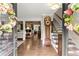 Elegant foyer showcases hardwood floors and stairs with detailed trim at 1540 Kinglet Ln, Marietta, GA 30062