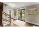 Inviting foyer with hardwood floors, a patterned rug, and front door at 1540 Kinglet Ln, Marietta, GA 30062
