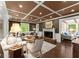 Living room with hardwood floors, fireplace, and coffered ceilings at 1540 Kinglet Ln, Marietta, GA 30062