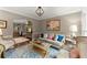 Cozy living room showcases stylish decor, hardwood floors, and connecting kitchen at 1540 Kinglet Ln, Marietta, GA 30062
