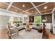 Spacious living room featuring coffered ceilings, neutral tones, and hardwood floors at 1540 Kinglet Ln, Marietta, GA 30062