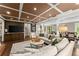 Comfortable living room with coffered ceilings, hardwood floors, and neutral decor at 1540 Kinglet Ln, Marietta, GA 30062