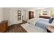 Bright main bedroom with wood floors, walk-in closet, and a calm, serene atmosphere at 1540 Kinglet Ln, Marietta, GA 30062