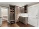 Mud room with custom wood cabinets, seating, and storage perfect for easy organization at 1540 Kinglet Ln, Marietta, GA 30062