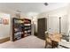 Office area with large bookshelf, closet, and desk at 1540 Kinglet Ln, Marietta, GA 30062