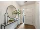Bright foyer featuring hardwood floors, stylish decor, and a welcoming entrance to the home at 171 North Trce, Alpharetta, GA 30009