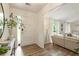 Inviting foyer with modern decor, hardwood flooring, and a seamless transition to the adjacent living space at 171 North Trce, Alpharetta, GA 30009