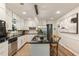 Bright kitchen featuring white cabinetry, granite countertops, stainless steel appliances and kitchen island at 171 North Trce, Alpharetta, GA 30009
