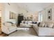 Spacious living room with hardwood floors, vaulted ceilings, and comfortable seating, perfect for relaxation at 171 North Trce, Alpharetta, GA 30009