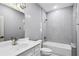 Well-lit bathroom featuring a tub/shower combination and a modern vanity at 2153 Cooper Lake Se Rd, Smyrna, GA 30080
