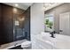 Chic bathroom with glass-enclosed shower, modern fixtures, and a stylish vanity at 2153 Cooper Lake Se Rd, Smyrna, GA 30080