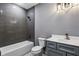 Stylish bathroom with a tiled shower and a sleek vanity with modern fixtures at 2153 Cooper Lake Se Rd, Smyrna, GA 30080