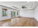 Spacious bedroom with large windows, hardwood flooring, and a tray ceiling at 2153 Cooper Lake Se Rd, Smyrna, GA 30080