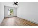 Bedroom with natural light, wood floors, and clean white walls at 2153 Cooper Lake Se Rd, Smyrna, GA 30080