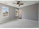 Inviting bedroom with neutral carpet, large windows, and plenty of natural light at 2153 Cooper Lake Se Rd, Smyrna, GA 30080