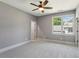Bright and spacious bedroom with neutral carpet and large windows, perfect for relaxation at 2153 Cooper Lake Se Rd, Smyrna, GA 30080