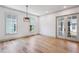 Open dining room with large windows, hardwood flooring, and French doors at 2153 Cooper Lake Se Rd, Smyrna, GA 30080