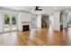 Bright living room with a fireplace, French doors to the outside, and hardwood floors at 2153 Cooper Lake Se Rd, Smyrna, GA 30080