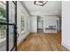Open concept living room with large windows and hardwood floors at 2153 Cooper Lake Se Rd, Smyrna, GA 30080