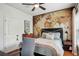 Comfortable bedroom featuring an accent wall-sized world map, a ceiling fan, and natural light at 1858 Preserve Way, Atlanta, GA 30341