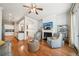 Open concept living room and kitchen with hardwood floors, modern furnishings, and lots of natural light at 1858 Preserve Way, Atlanta, GA 30341