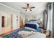 Stylish bedroom with a blue rug, elegant furniture, and plenty of natural light at 1858 Preserve Way, Atlanta, GA 30341