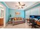 Bright office space with a sofa, desk, natural light, and view to the attached bathroom at 1858 Preserve Way, Atlanta, GA 30341