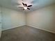 Bedroom with ceiling fan and carpeted floors at 3722 Cherokee Overlook Dr, Canton, GA 30115