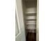Linen closet with shelving for storing towels and bedding at 3722 Cherokee Overlook Dr, Canton, GA 30115