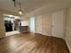 Open floor plan showing the dining area leading to a kitchen with stainless steel appliances at 3722 Cherokee Overlook Dr, Canton, GA 30115