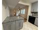 Open floor plan with a kitchen island that flows into the dining room at 3722 Cherokee Overlook Dr, Canton, GA 30115