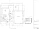 First floor plan highlighting the layout of the foyer, kitchen, living room, and a 3-car garage at 7947 Post Rd, Winston, GA 30187