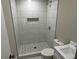 Contemporary bathroom featuring stylish tile and modern fixtures at 1387 Renee Dr, Decatur, GA 30035