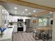 Modern kitchen with stainless steel appliances and a breakfast bar at 1387 Renee Dr, Decatur, GA 30035