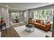 Cozy living room with hardwood floors and abundant natural light at 1387 Renee Dr, Decatur, GA 30035