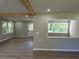 Open concept living room with hardwood floors, recessed lighting, and natural light at 1387 Renee Dr, Decatur, GA 30035