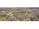 A wide aerial of the property showing treed area and surrounding landscape at 176 Old Burnt Hickory Rd, Douglasville, GA 30134