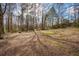 Expansive property with a mix of trees and open space offering privacy and a natural setting at 176 Old Burnt Hickory Rd, Douglasville, GA 30134