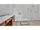Luxurious primary bathroom showcasing a soaking tub, a glass enclosed shower and dual vanities at 1925 Stonewyck Ct, Cumming, GA 30041