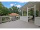 Relaxing screened-in porch perfect for outdoor dining, featuring a ceiling fan and comfortable seating at 1925 Stonewyck Ct, Cumming, GA 30041