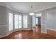 Elegant dining room featuring hardwood floors, large windows, and crown molding at 2157 Brandon Lee Sw Dr, Marietta, GA 30008