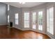 Spacious living room boasts hardwood floors, fireplace, and doors to a patio at 2157 Brandon Lee Sw Dr, Marietta, GA 30008