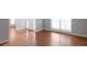Inviting living room featuring beautiful hardwood floors, neutral walls, and natural light at 2157 Brandon Lee Sw Dr, Marietta, GA 30008