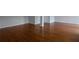Spacious living room featuring newly refinished hardwood floors and fresh paint at 2157 Brandon Lee Sw Dr, Marietta, GA 30008