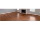 Cozy living room featuring hardwood floors and a fireplace with white trim at 2157 Brandon Lee Sw Dr, Marietta, GA 30008