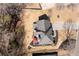 An aerial view showing the backyard layout, including patio, fire pit, landscaping, and surrounding trees at 3519 Wellsley Dr, Powder Springs, GA 30127