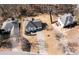 Aerial view of home in quiet neighborhood with mature trees and long driveway at 3519 Wellsley Dr, Powder Springs, GA 30127