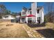 Spacious backyard features a patio with outdoor dining and relaxation spaces plus a hot tub at 3519 Wellsley Dr, Powder Springs, GA 30127
