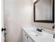 Well-lit bathroom with white cabinets and a modern sink at 3519 Wellsley Dr, Powder Springs, GA 30127