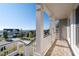Inviting porch with white columns that offers scenic neighborhood views at 410 Ward Farm Dr, Powder Springs, GA 30127